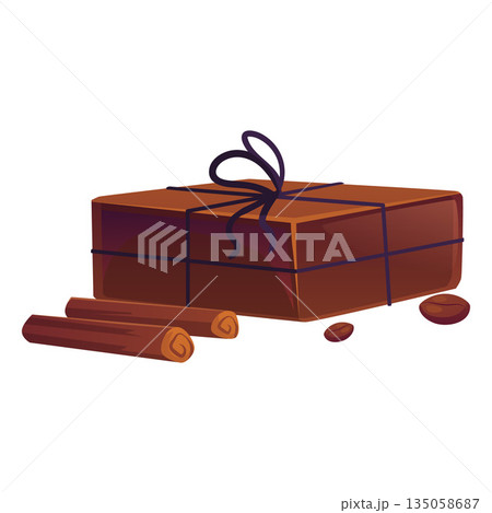 A brown bar of soap tied with a bow, with cinnamon sticks and coffee beans. 135058687