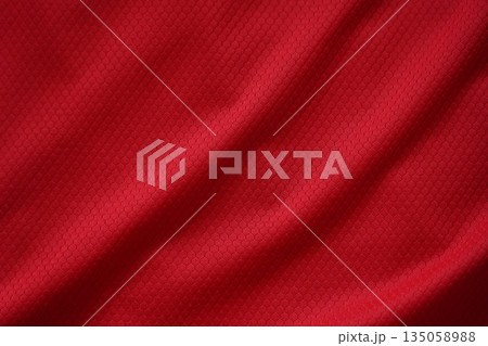 Close up of red football jersey sports clothing fabric texture. 135058988