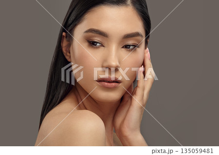 Closeup portrait of young woman with healthy skin. Closeup portrait of young woman with healthy skin. 135059481