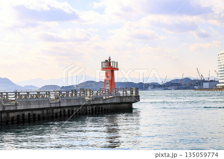 Shimonoseki Tobamamachi Breakwater Lighthouse, A small lighthouse at the entrance to Shimonoseki Arcaport, Japan. Shimonoseki Tobamamachi Breakwater Lighthouse, A small lighthouse at the entrance to Shimonoseki Arcaport, Japan. 135059774