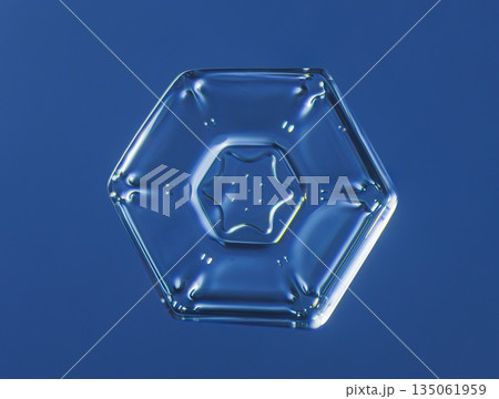 Natural snowflake crystal in blue background 135061959