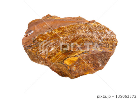 Untreated Tiger's Eye Stone on Isolated Background Untreated Tiger's Eye Stone on Isolated Background 135062572
