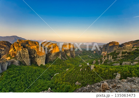 Monastery of Varlaam, Saint Nicholas, Rousanou and Megalo Meteoro at sunrise Monastery of Varlaam, Saint Nicholas, Rousanou and Megalo Meteoro at sunrise 135063473