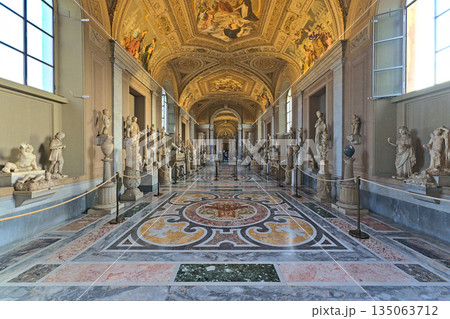 Inside of the Vaticans museums in one of the long hallways Inside of the Vaticans museums in one of the long hallways 135063712