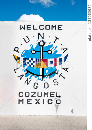 Welcome sign for Punta Langosta in Cozumel Mexico near the water Welcome sign for Punta Langosta in Cozumel Mexico near the water 135063980