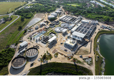 Industrial water treatment facility with water cleaning cisterns and piping system 135065608