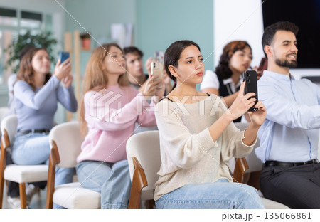 Students take pictures of screen or scan QR code 135066861