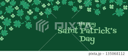 Green banner with shamrock pattern and holiday text. Elegant background for Saint Patricks Day websites, headers and promotions. 135068112