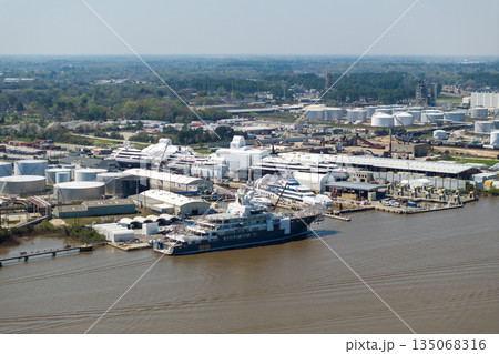 Commercial shipyard dock for luxury sea yachts manufacturing. Construction and assembling of deep water ships 135068316