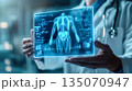 A doctor carefully examines a virtual x-ray projection with focused attention. Generative AI. 135070947