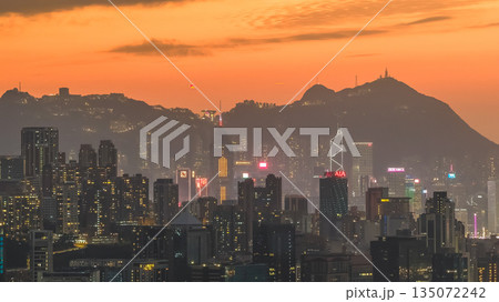Jan 4 2026 Hong Kong Skyline Glows Under Fiery Sunset 135072242