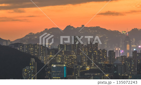 Jan 4 2026 Hong Kong Skyline Glows Under Fiery Sunset 135072243
