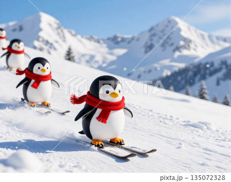 雪山をスキーで滑走するペンギンたち 135072328