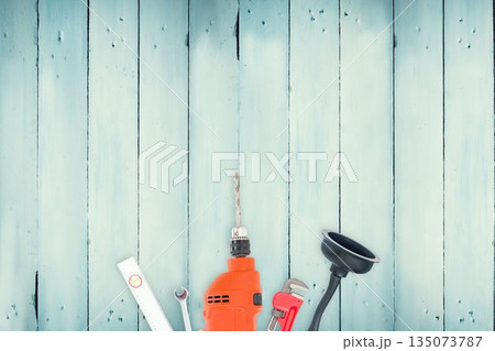 DIY tools on wooden background 135073787