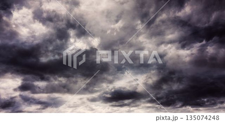 Dense dark grey clouds are being shown in open sky flat design, featuring layered storm patterns 135074248
