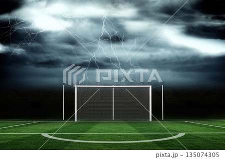 Football pitch under stormy sky 135074305