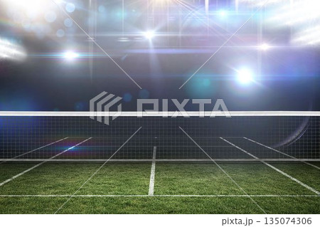 Illuminated tennis stadium at night Illuminated tennis stadium at night 135074306