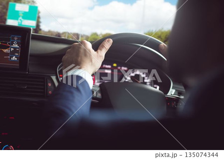 Close-up of steering wheel 135074344