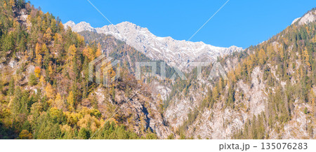 Scenery Jiuzhaigou national park in Sichuan, China. Beautiful of Arrow Bamboo Lake and snow mountain in Autumn season. Famous Landmark and Vacation near Chengdu, China. Asia travel concept 135076283