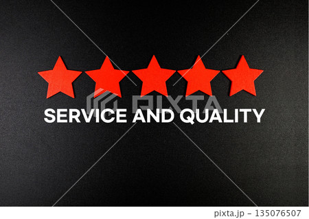 Service and Quality text with five star on black background Service and Quality text with five star on black background 135076507