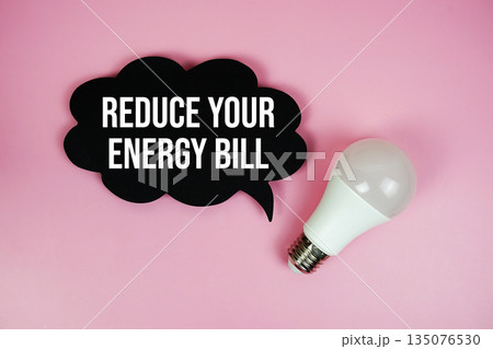 Reduce Your Energy Bill with light bulb on pink background Reduce Your Energy Bill with light bulb on pink background 135076530