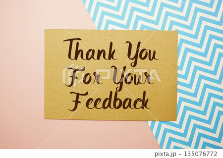 Thank you for your Feedback text written on pink background Thank you for your Feedback text written on pink background 135076772