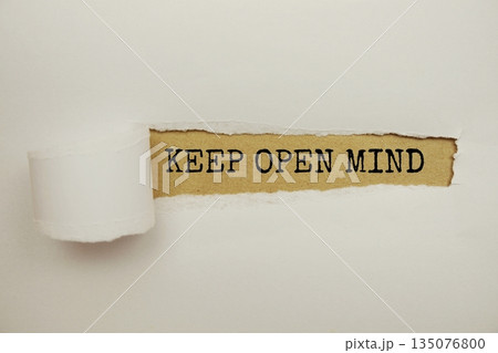 Keep Open Mind message written on craft paper with torn paper background Keep Open Mind message written on craft paper with torn paper background 135076800