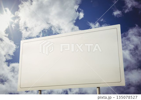 White billboard against cloudy sky White billboard against cloudy sky 135078527