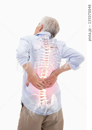 Highlighted spine of man with back pain Highlighted spine of man with back pain 135078846