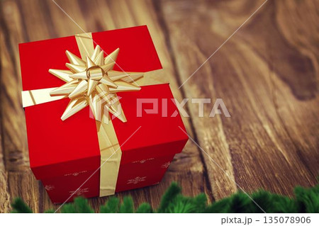 Red gift box is sitting on wooden tabletop in flat-design, with gold ribbon and pine branches Red gift box is sitting on wooden tabletop in flat-design, with gold ribbon and pine branches 135078906