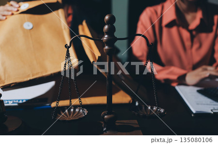 Consultation and conference of professional businesswoman and Male lawyers working and discussion having at law firm in office. Concepts of law, Judge gavel with scales of justice Consultation and conference of professional businesswoman and Male lawyers working and discussion having at law firm in office. Concepts of law, Judge gavel with scales of justice 135080106