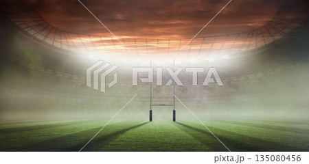 Flat design showing empty rugby stadium with goal posts, floodlights, grass pitch, drifting haze 135080456
