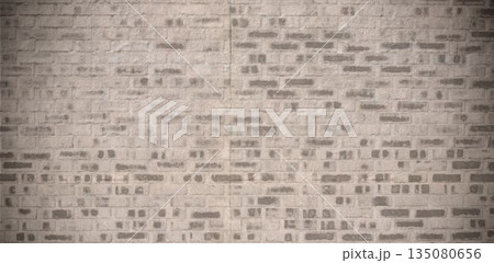 Beige brick wall is showing subtle weathering and mortar outline with central seam in flat design 135080656