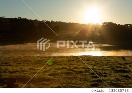 Beautiful sunset reflected in the lake 135080758