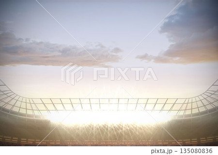 Large football stadium under cloudy blue sky Large football stadium under cloudy blue sky 135080836