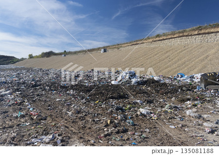 Pollution concept. Garbage pile in trash dump or landfill Pollution concept. Garbage pile in trash dump or landfill 135081188