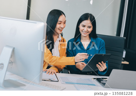 Meeting, tablet and business people in office for discussion, collaboration or planning project. Teamwork, feedback and employees talking for product development, conversation or idea at design firm 135081228