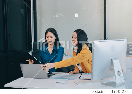 Meeting, tablet and business people in office for discussion, collaboration or planning project. Teamwork, feedback and employees talking for product development, conversation or idea at design firm 135081229