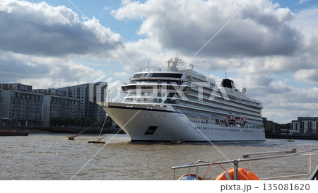 This is river thames london with ferris boat This is river thames london with ferris boat 135081620