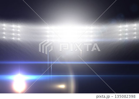 Cluster of white spotlights is shining in dark flat design, showing lens flares and blue streaks 135082398