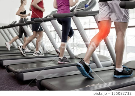 Jogger experiencing knee pain Jogger experiencing knee pain 135082732