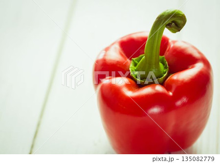 Fresh red pepper on wooden table Fresh red pepper on wooden table 135082779