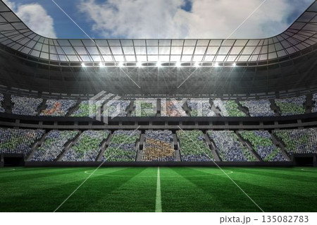 Large football stadium under spotlights 135082783