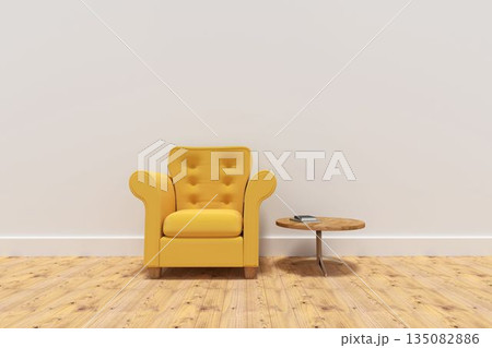 Yellow armchair by table on floor against wall Yellow armchair by table on floor against wall 135082886