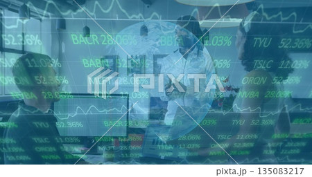 Presenting white male executive gesturing at meeting table, with monitors and stock-ticker overlay Presenting white male executive gesturing at meeting table, with monitors and stock-ticker overlay 135083217