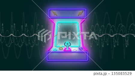 Glowing neon-lit arcade cabinet with joystick controls pulsating on teal backdrop, with waveforms Glowing neon-lit arcade cabinet with joystick controls pulsating on teal backdrop, with waveforms 135083529