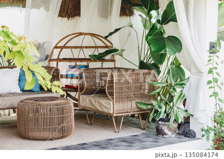 Cozy Rattan Lounge Area with Tropical Plants. Panglao, Philippines Cozy Rattan Lounge Area with Tropical Plants. Panglao, Philippines 135084174