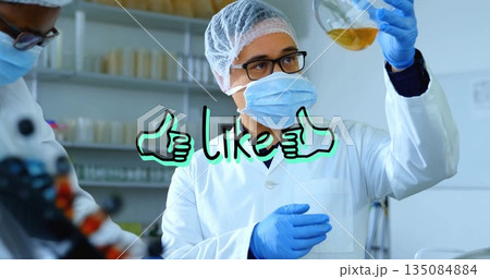 Holding flask containing amber solution male scientist wearing lab coat in lab with like graphic Holding flask containing amber solution male scientist wearing lab coat in lab with like graphic 135084884