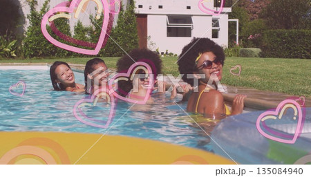Leaning four women wearing swimwear smiling in backyard pool, with yellow float and heart overlays Leaning four women wearing swimwear smiling in backyard pool, with yellow float and heart overlays 135084940