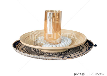 Candle in dark glass bottle on beautiful plate, soft focus, photo on white background, isolated object 135085987